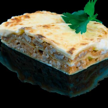 Meat lasagna with bechamel sauce and cheese